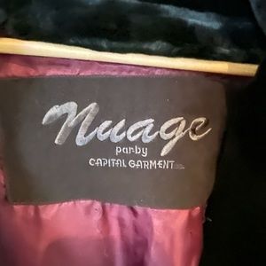 Dark brown faux fur coat. Mid length. XL. Excellent condition. Rarely worn.